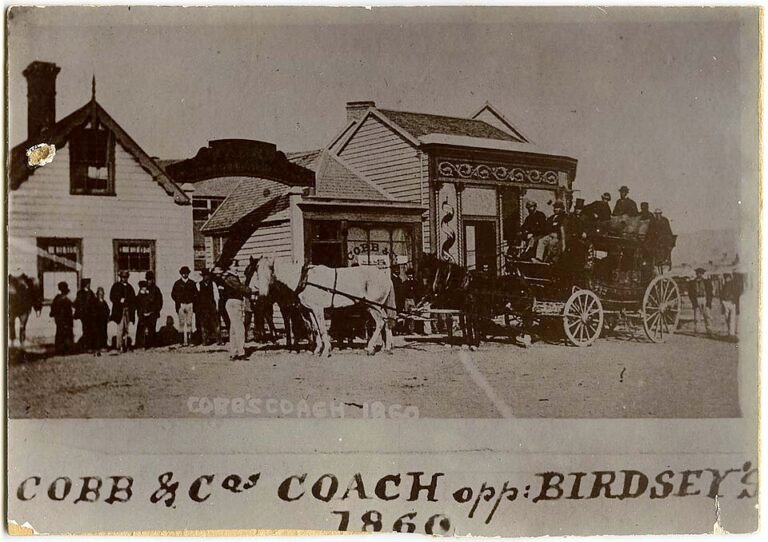 A coach parked ready to transport a large pilgrim group