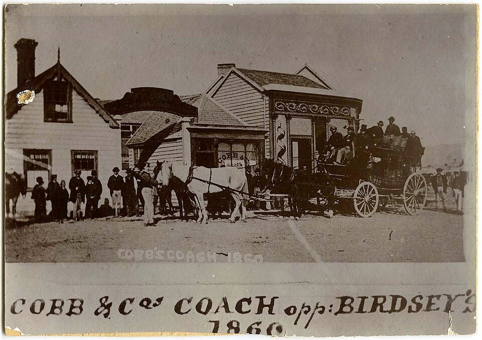 A coach parked ready to transport a large pilgrim group