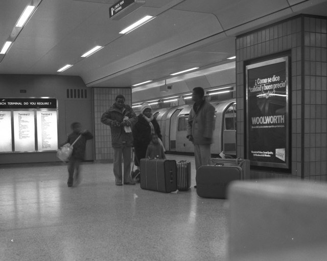 A UK family with children preparing for a school holiday trip