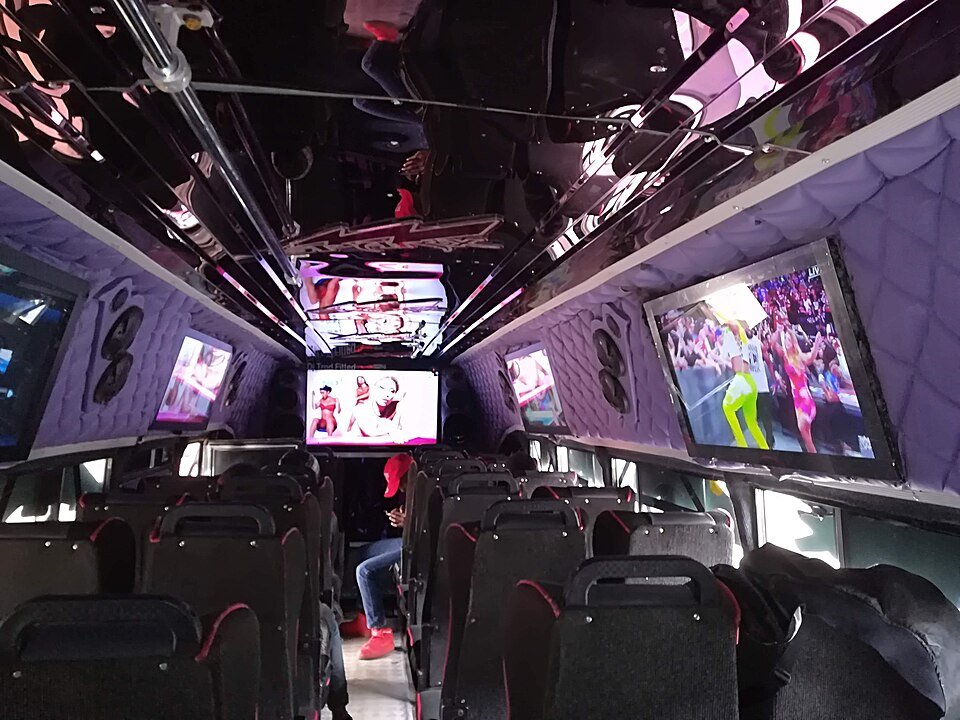 Passengers seated together in a shared group vehicle