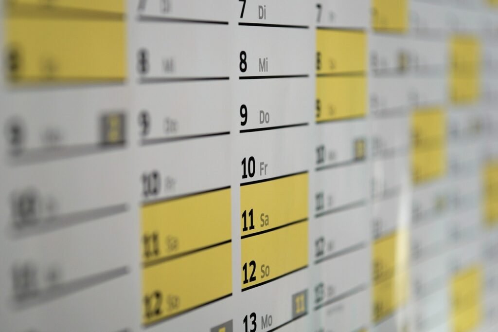 A calendar with dates marked, representing checking permit and travel dates against each other