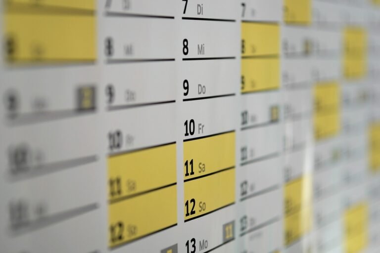 A calendar with dates marked, representing checking permit and travel dates against each other