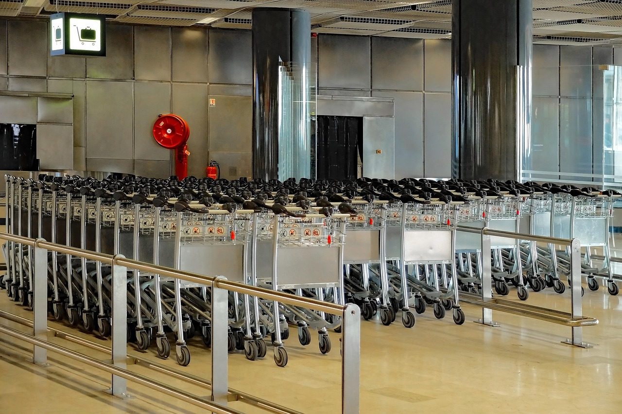 Airport luggage cart, a reminder to check a vehicle's luggage capacity before booking