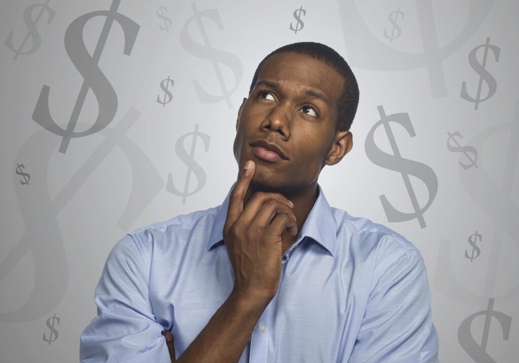 Traveller reviewing finances while planning a Hajj transport budget