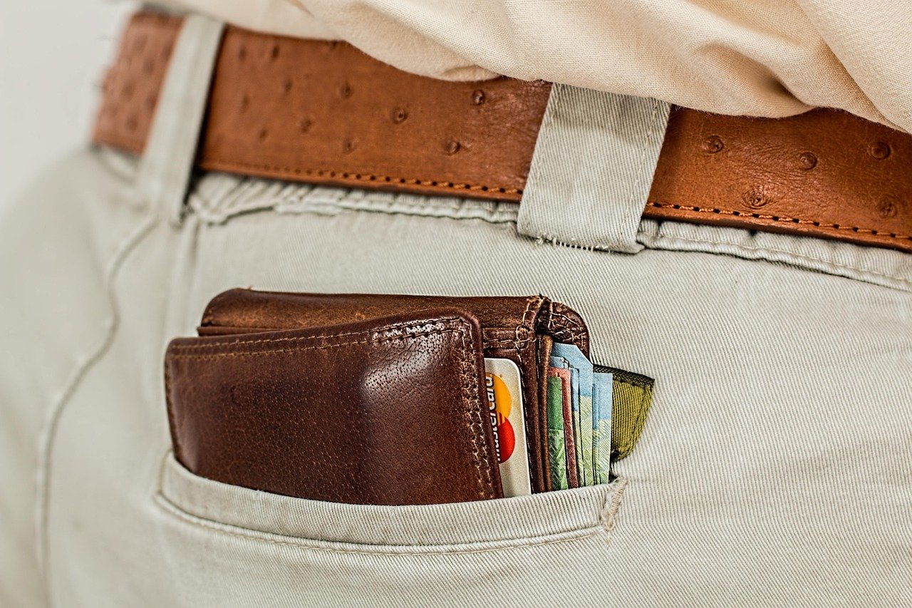 Wallet with cards representing documents and payment kept during a journey
