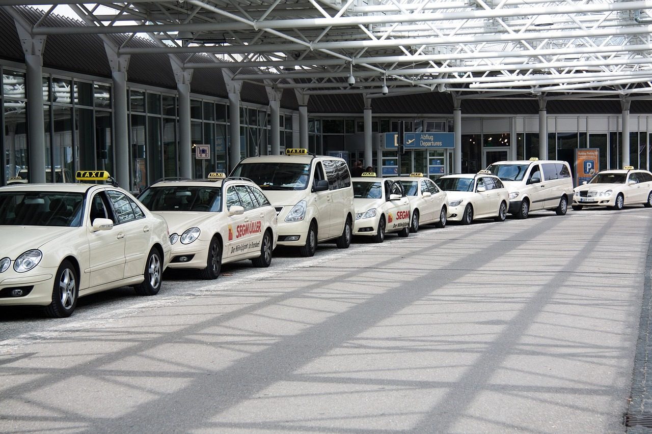 A private taxi arriving to collect a pilgrim at Jeddah airport arrivals