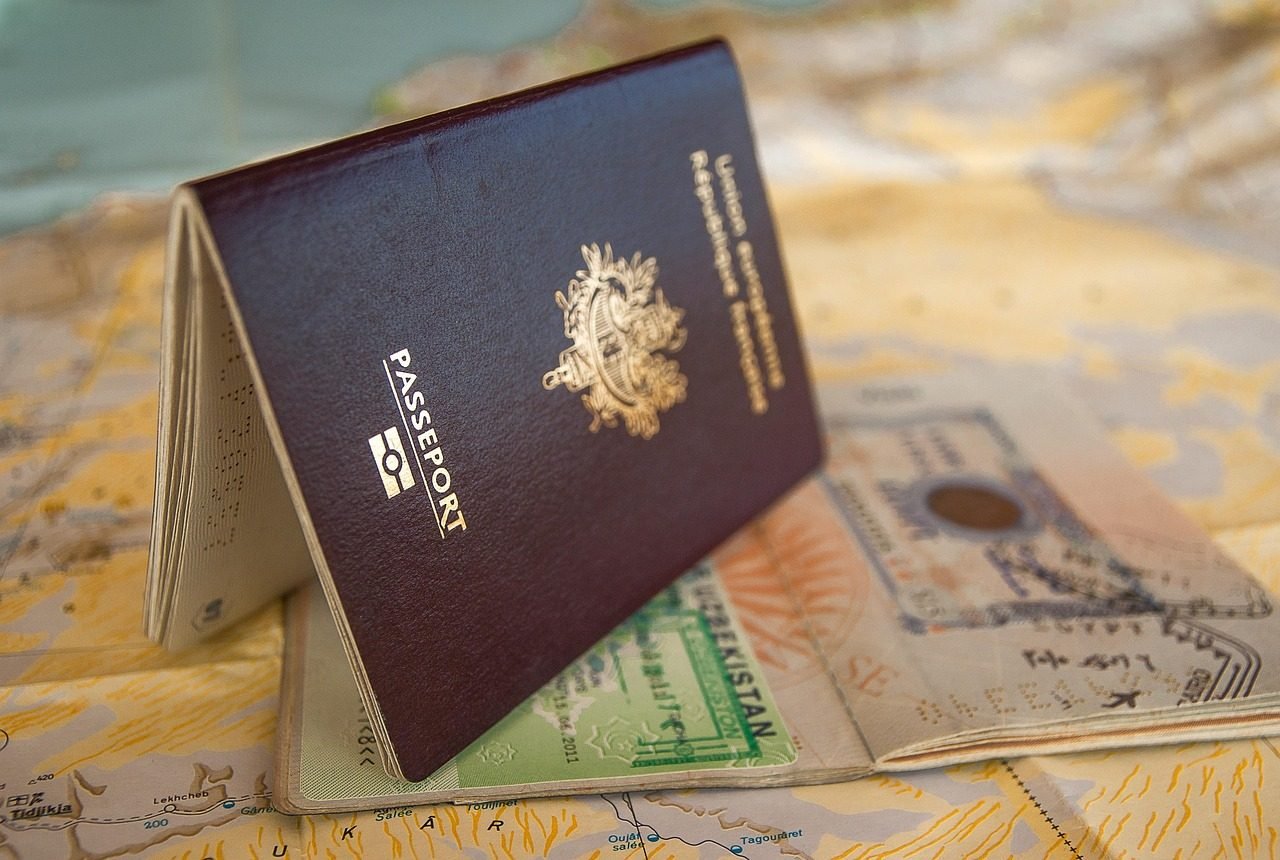 Saudi Arabia entry visa and travel documents laid out on a table