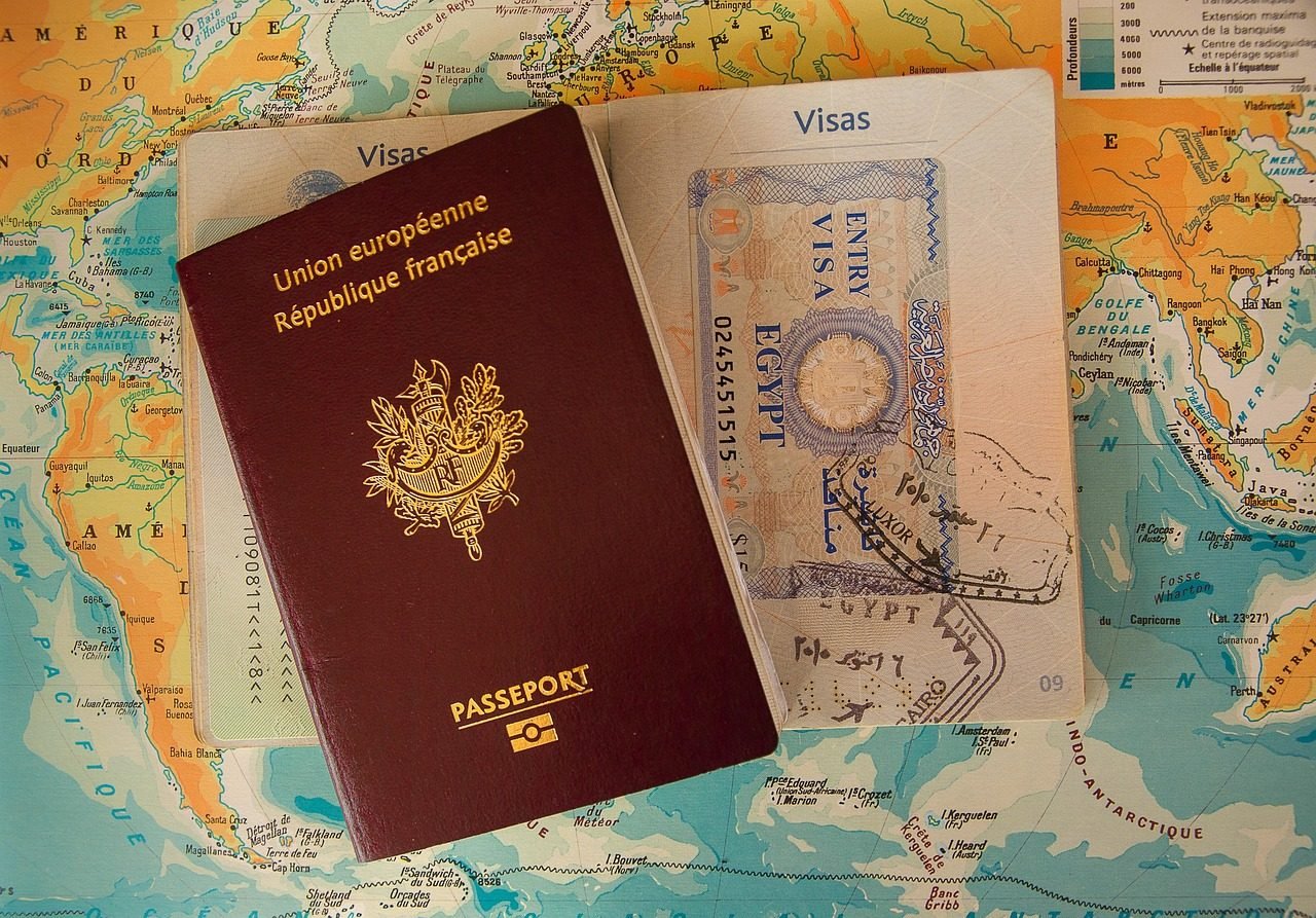 Pilgrim checking Umrah visa documents and passport before travel to Saudi Arabia