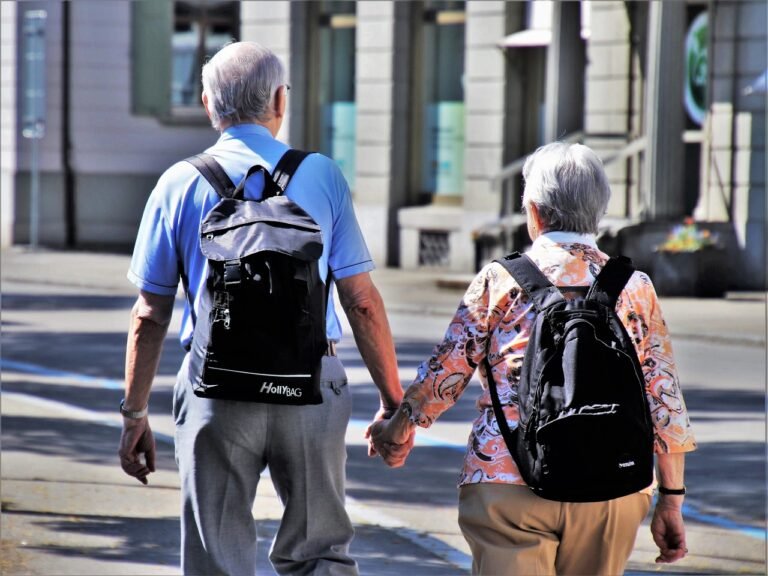 An elderly couple travelling together, representing family Umrah trips