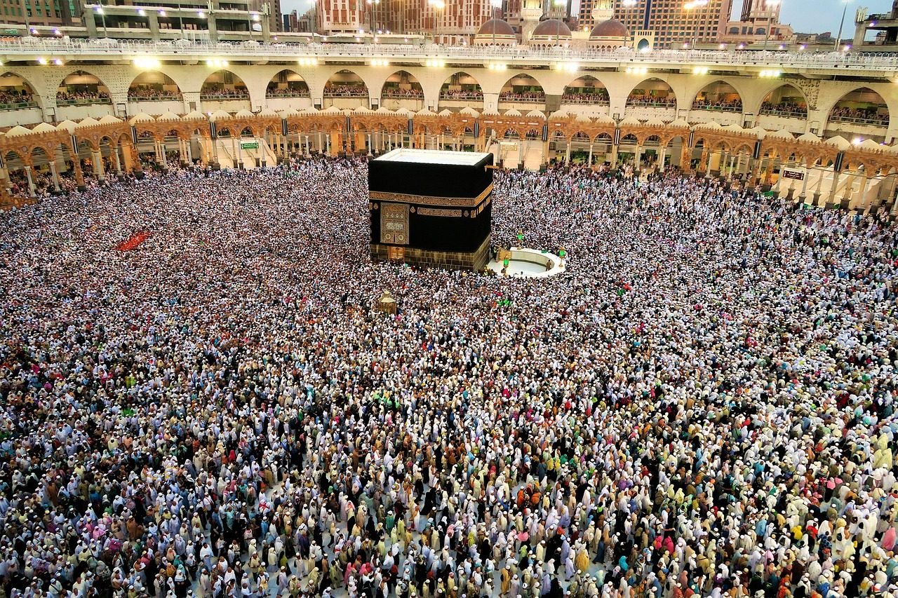 Crowds of pilgrims arriving during the busy Hajj travel season in Saudi Arabia