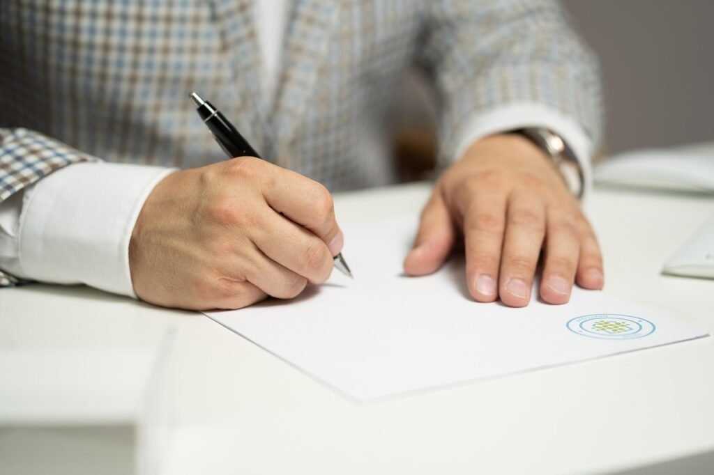 Pilgrim reviewing travel documents and transport plans independently
