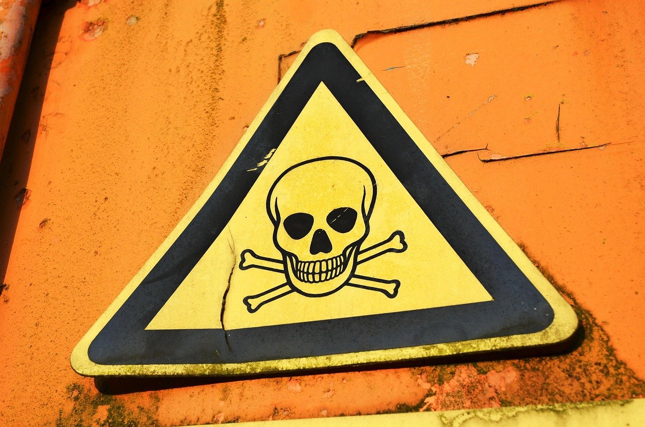 Warning sign representing red flags to watch for in a booking confirmation