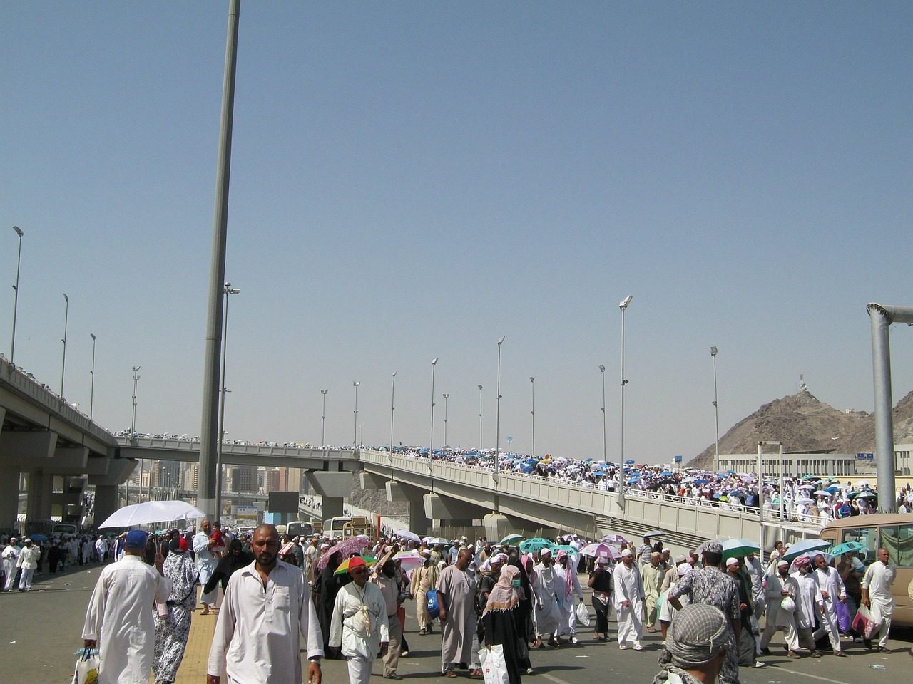 Calendar and travel planning documents for Hajj season transport booking