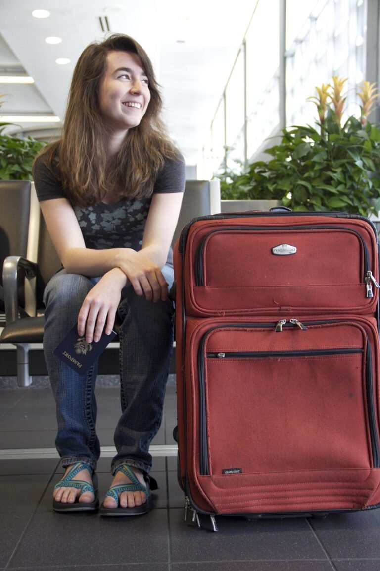 Solo pilgrim with luggage waiting for a pre-booked airport transfer