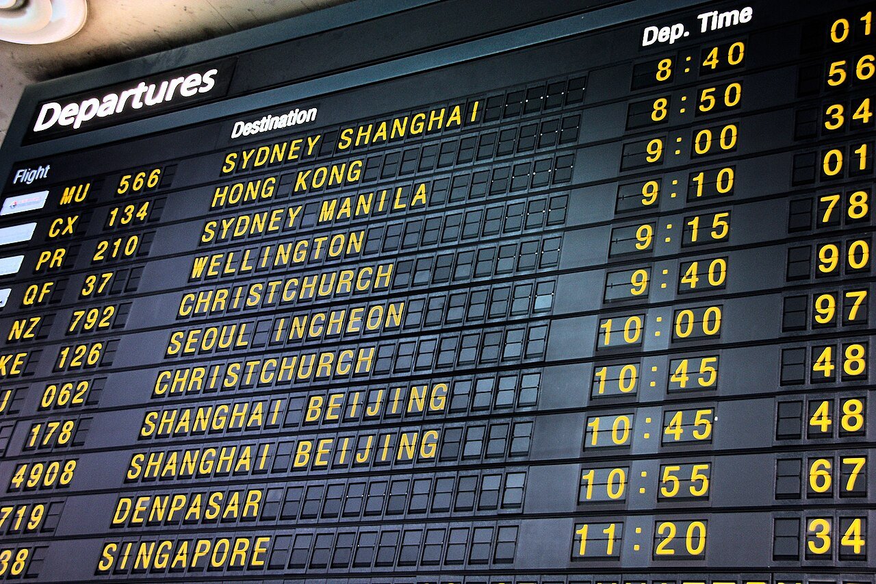Airport departures board showing flight information