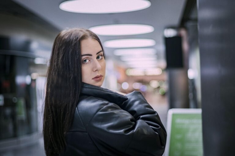 Solo female traveller with luggage at an airport